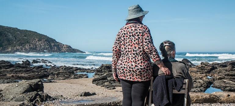 two ladies on the shore thinking about best places to retire in Florida