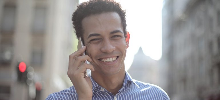 man on the phone smiling