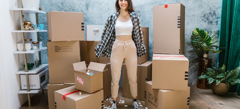 A woman with moving boxes