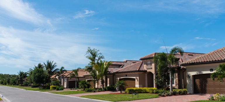 A person thinking about Bradenton movers while looking at the street in Bradenton