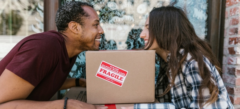 Zephyhills movers carrying boxes