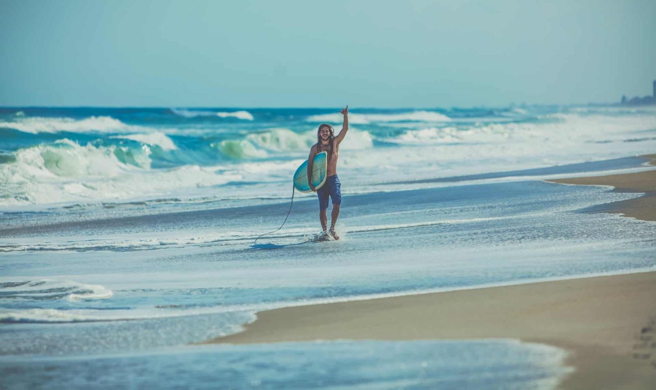 A happy man on the beach in Melbourne, FL