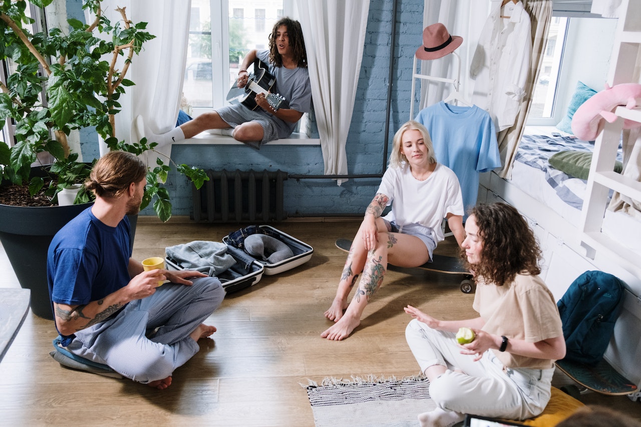 a couple of freshmen sitting in their dorm room