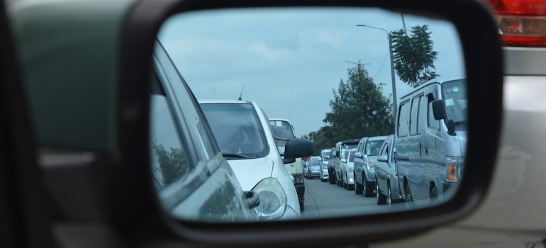 heavy traffic in the car side mirror