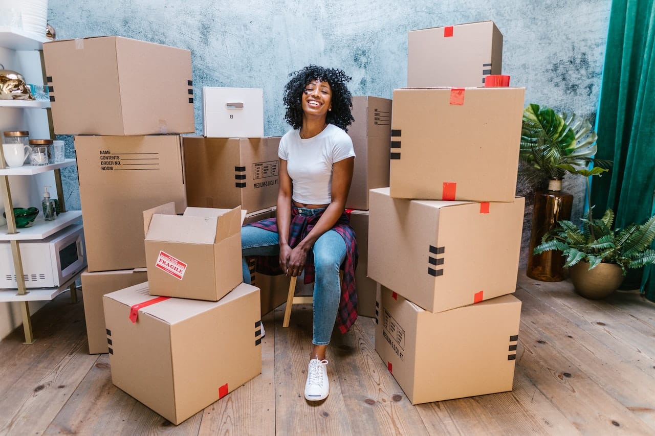 A woman with moving boxes