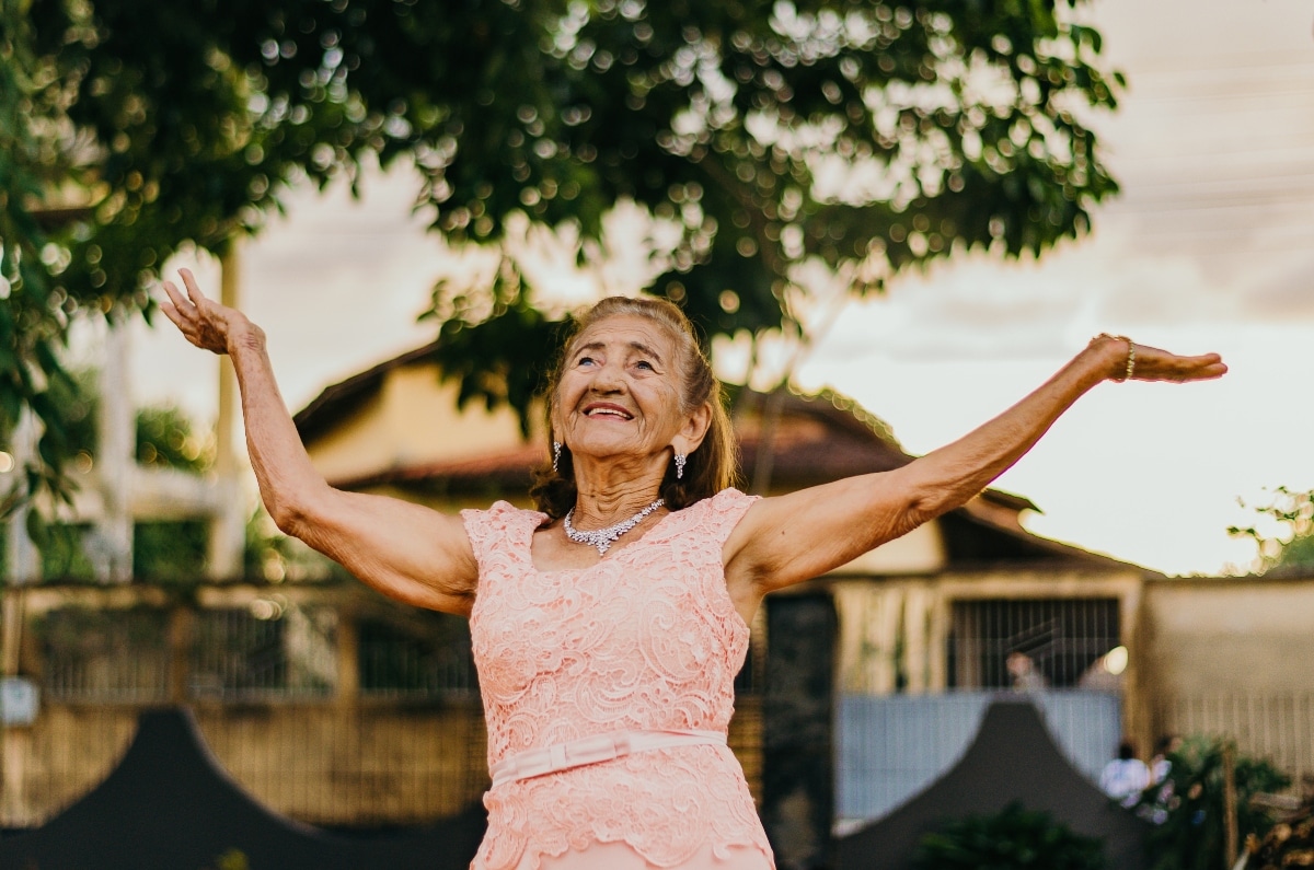 A senior woman dancing