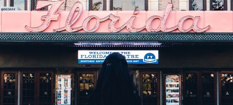 a woman starring at the Florida theater