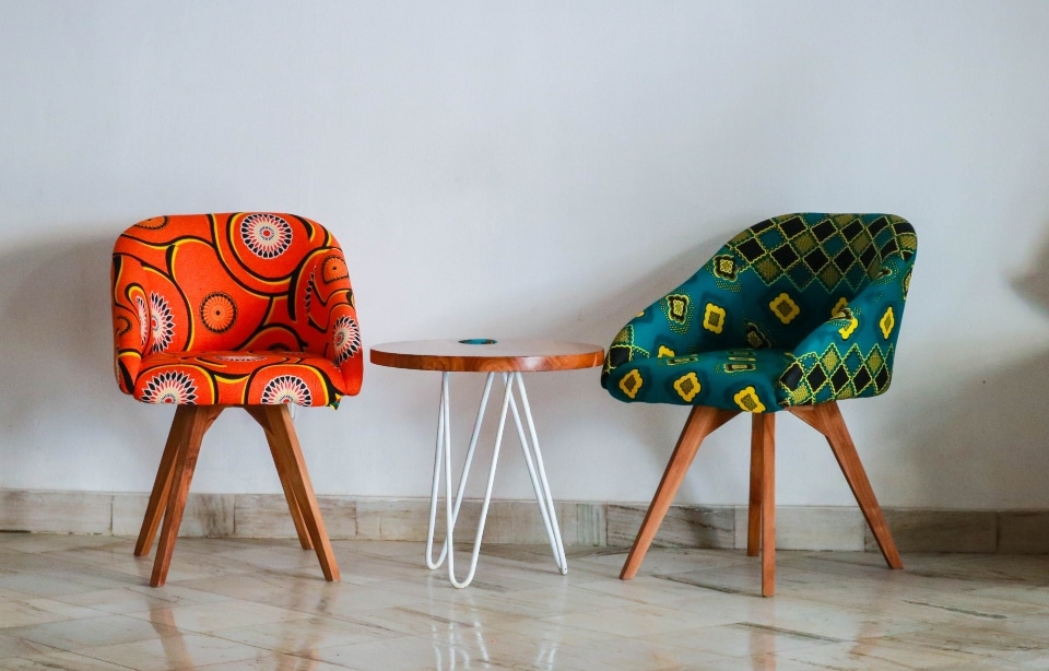 two colorful chairs symbolizing how to thrift furniture for your new Tampa home