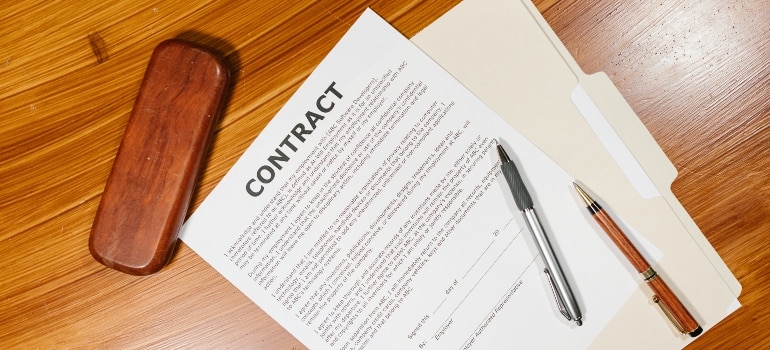 A contract on the table ready to be signed 