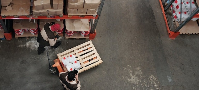 a man pushing a cart in one of the storage options in Florida