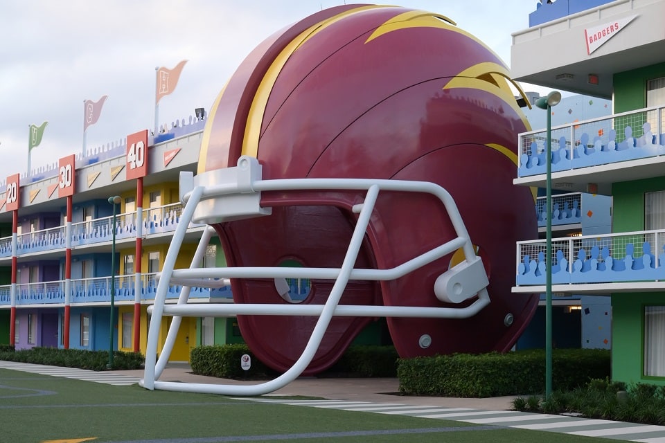 free photo of american football helmet in wall of building in disneys all star sports resort