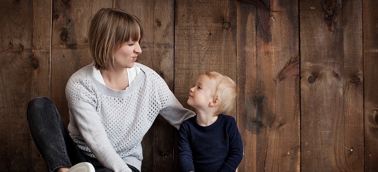 a single mom discussing a move with her son